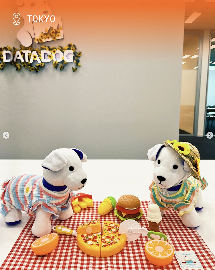Bits plushies at a miniature picnic in Datadog Tokyo office